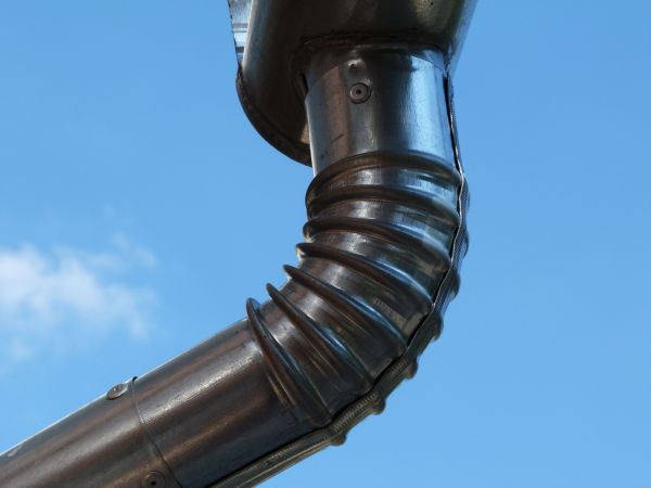 Metal Downspout Installation in Rochester